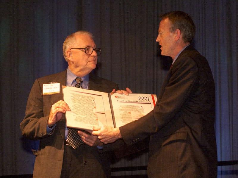 Dr. Eugene Braunwald (right) receives the Academic Mentorship Award in 1999 from then-American Heart Association President Dr. Lynn Smaha. (Photo by Todd Buchanan for the American Heart Association)